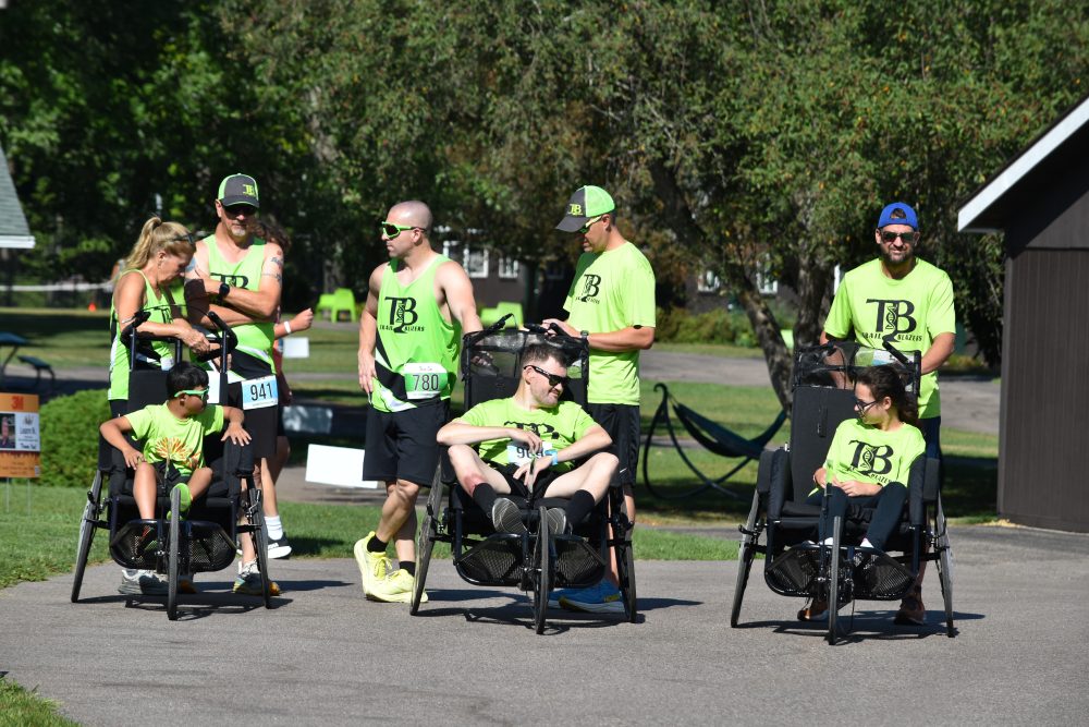 Team from Trail Blazers waiting to start the race at the Hustle S'more for Lions Camp